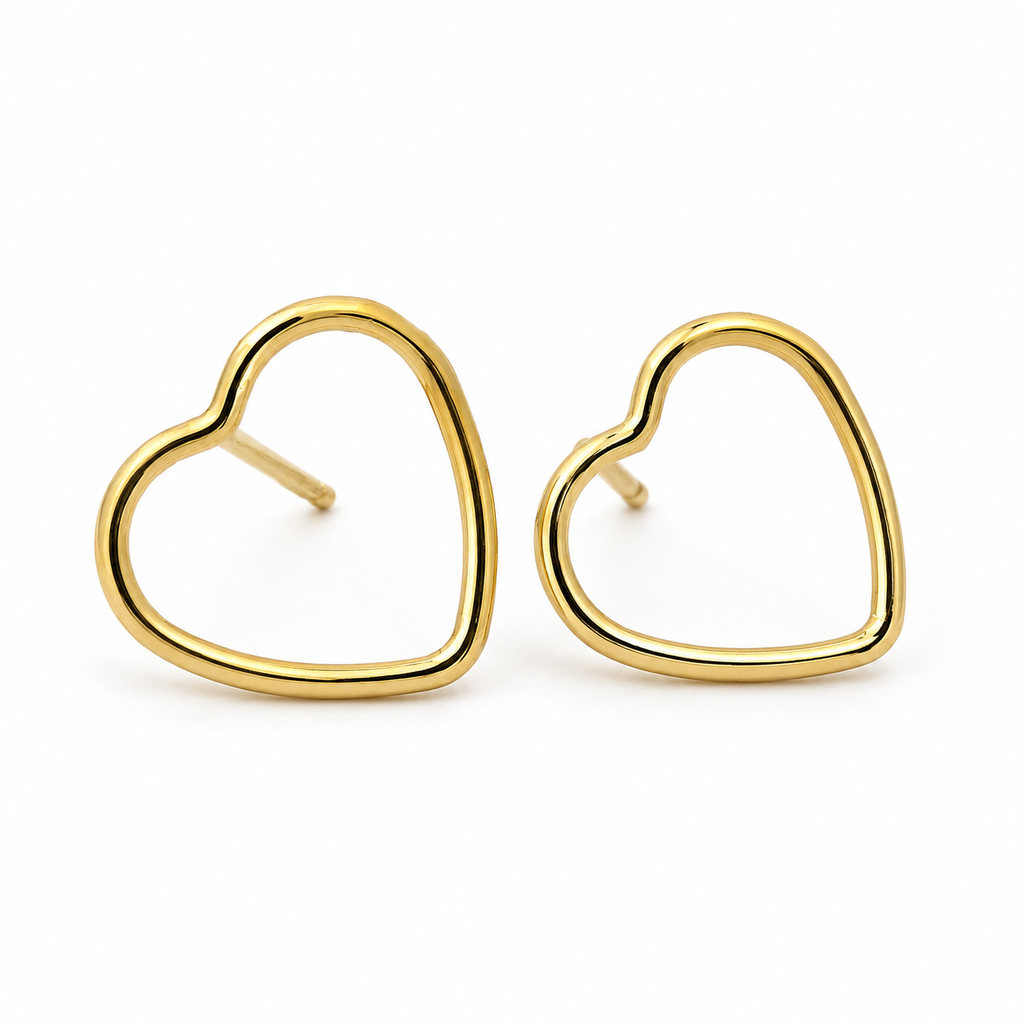 Gold heart-shaped earrings on a white background