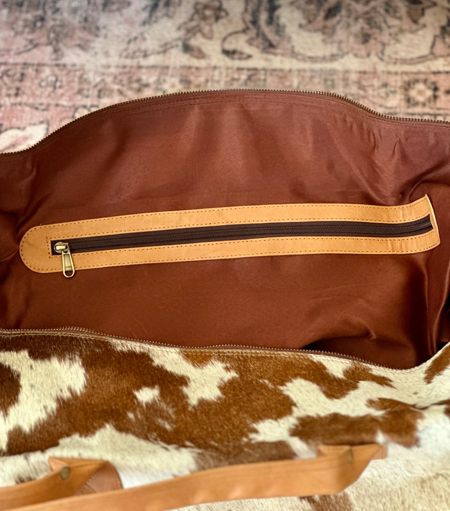 cow hide duffle bag